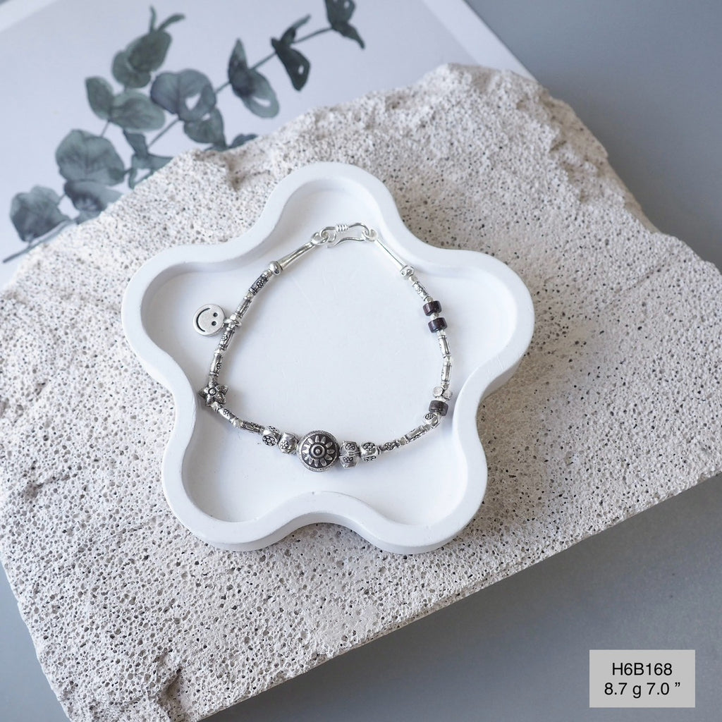 98% pure silver, 100% style. Love this handmade Thai bracelet.