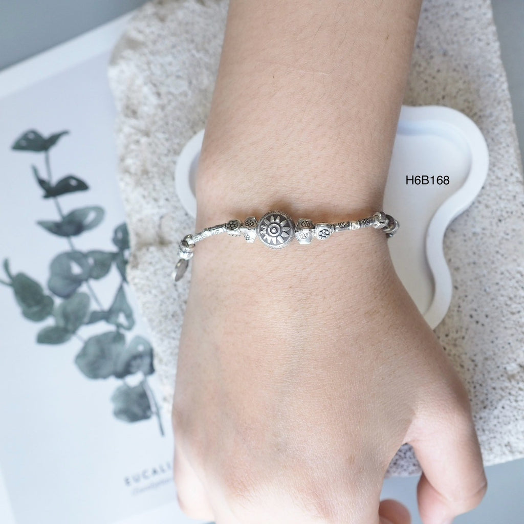 98% pure silver, 100% style. Love this handmade Thai bracelet.