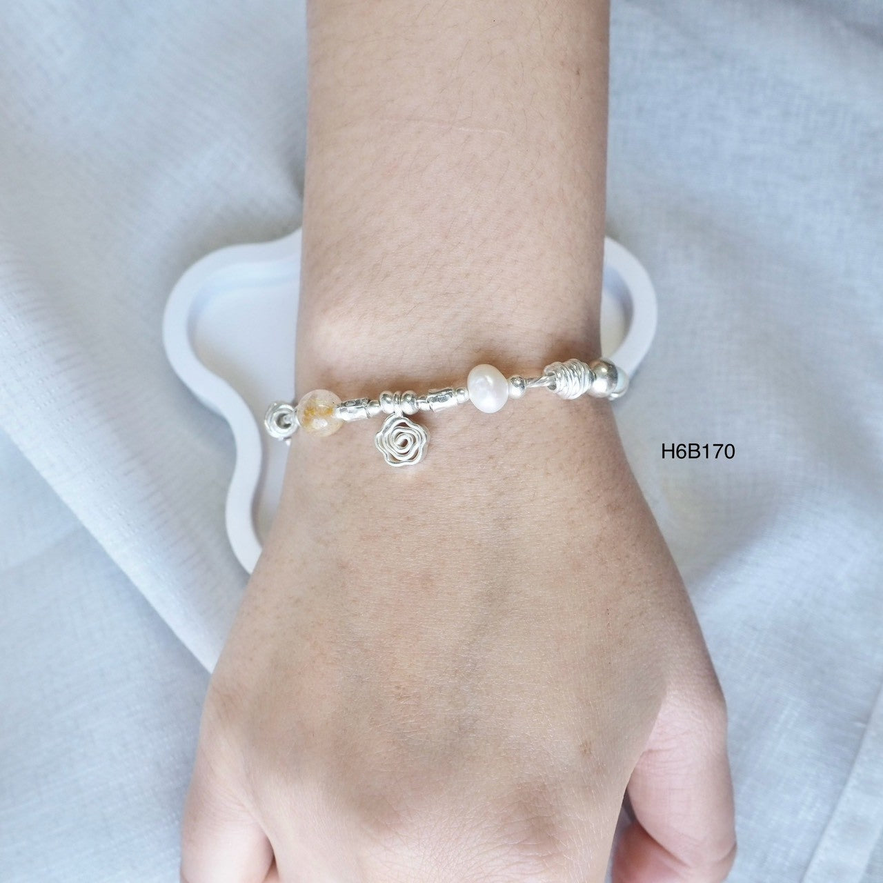 Elevate your wrist game with this unique Thai silver bracelet.