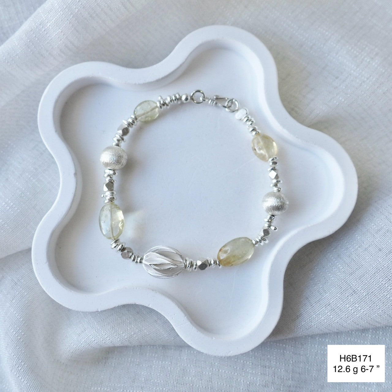 Pure 98% silver, crafted by hand. This bracelet is a must-have.