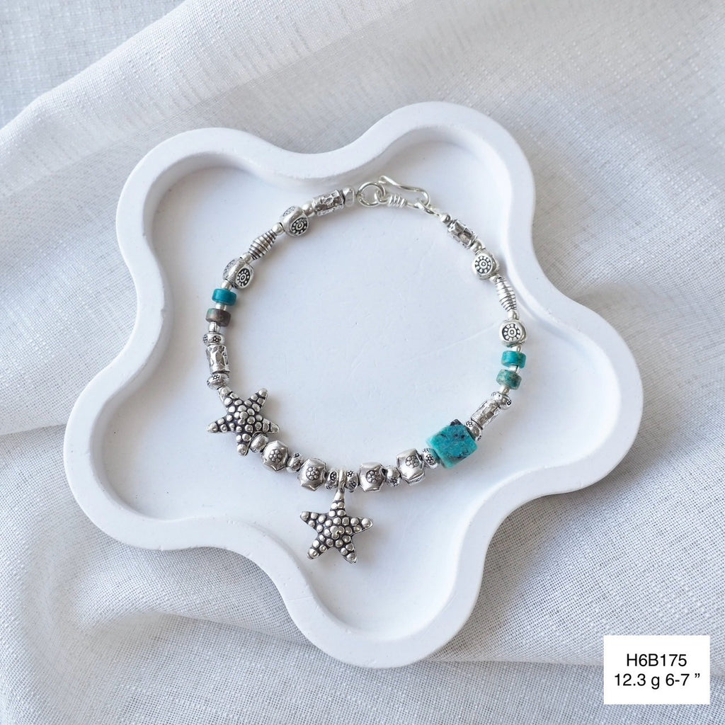 Timeless beauty. Shop our handmade 98% silver bracelet now.