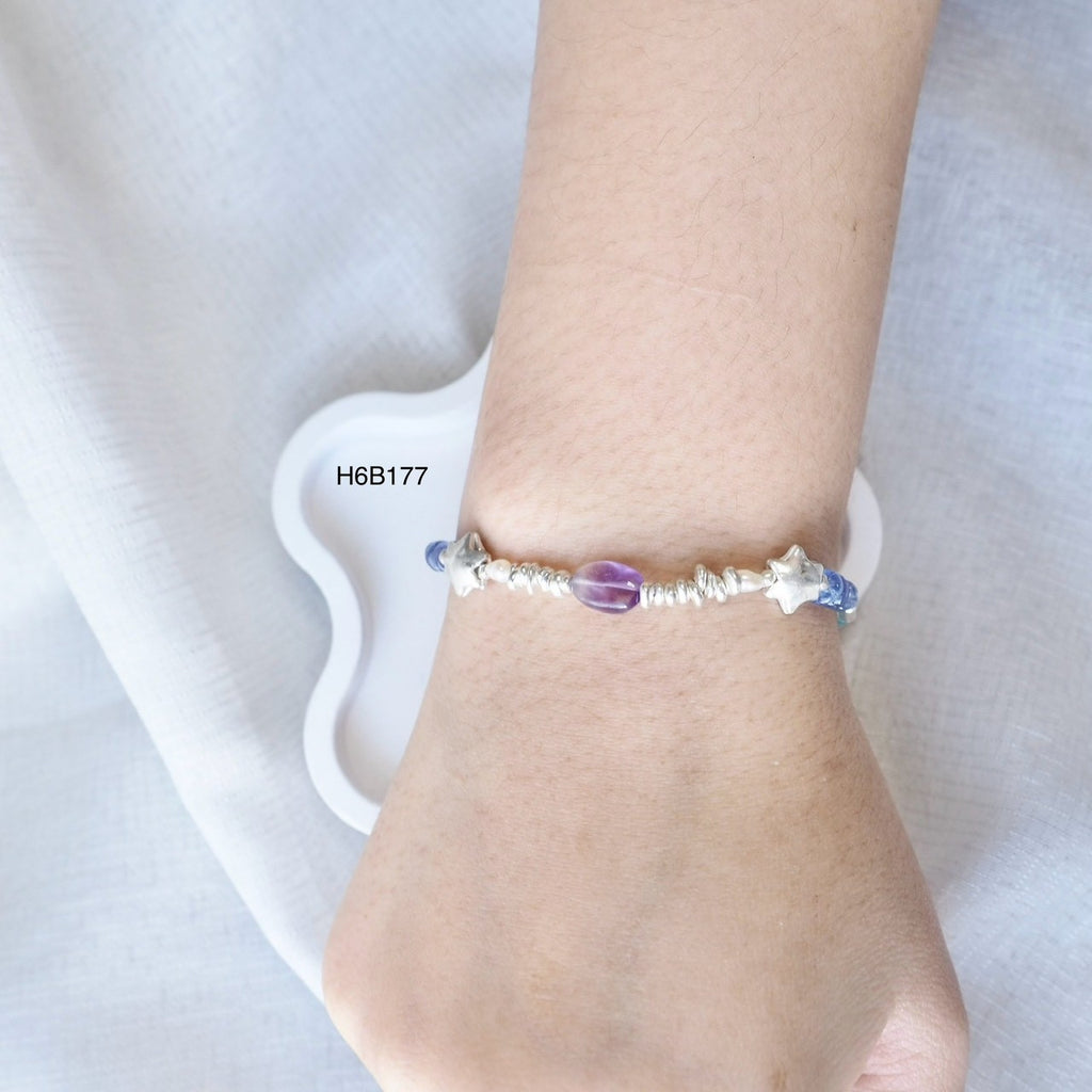 Every handmade bracelet tells a unique story of Thai tradition.