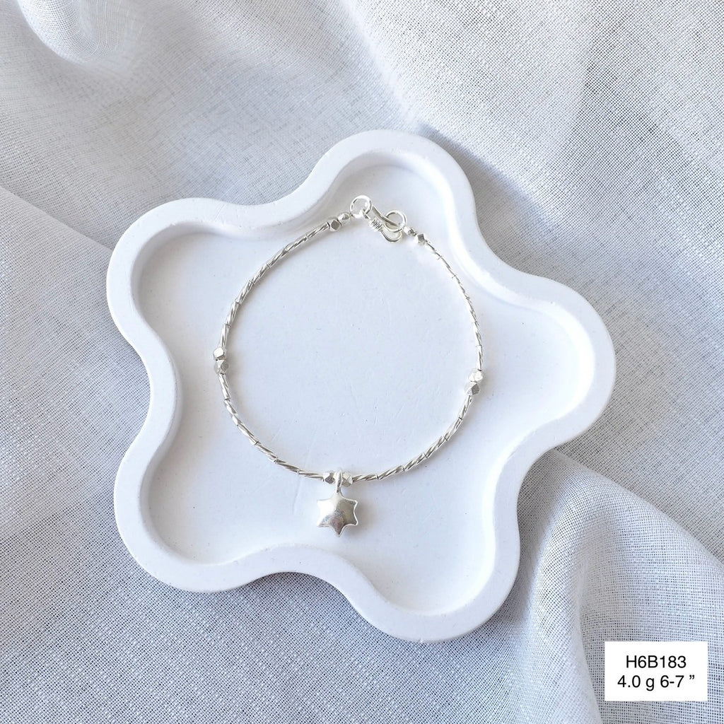 Traditional Thai techniques meet modern style in this silver bracelet.
