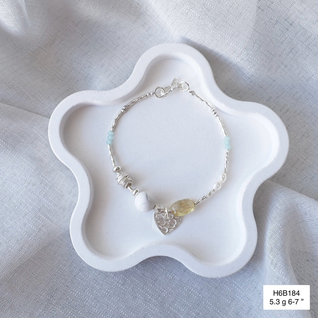 Feel the premium quality of a 98% pure silver bracelet.