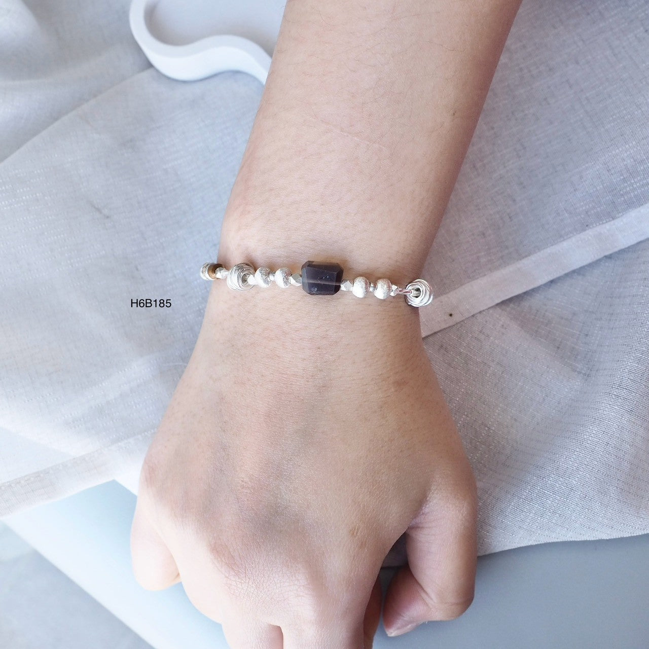 Intricate details, handmade charm. Love this Thai silver bracelet.