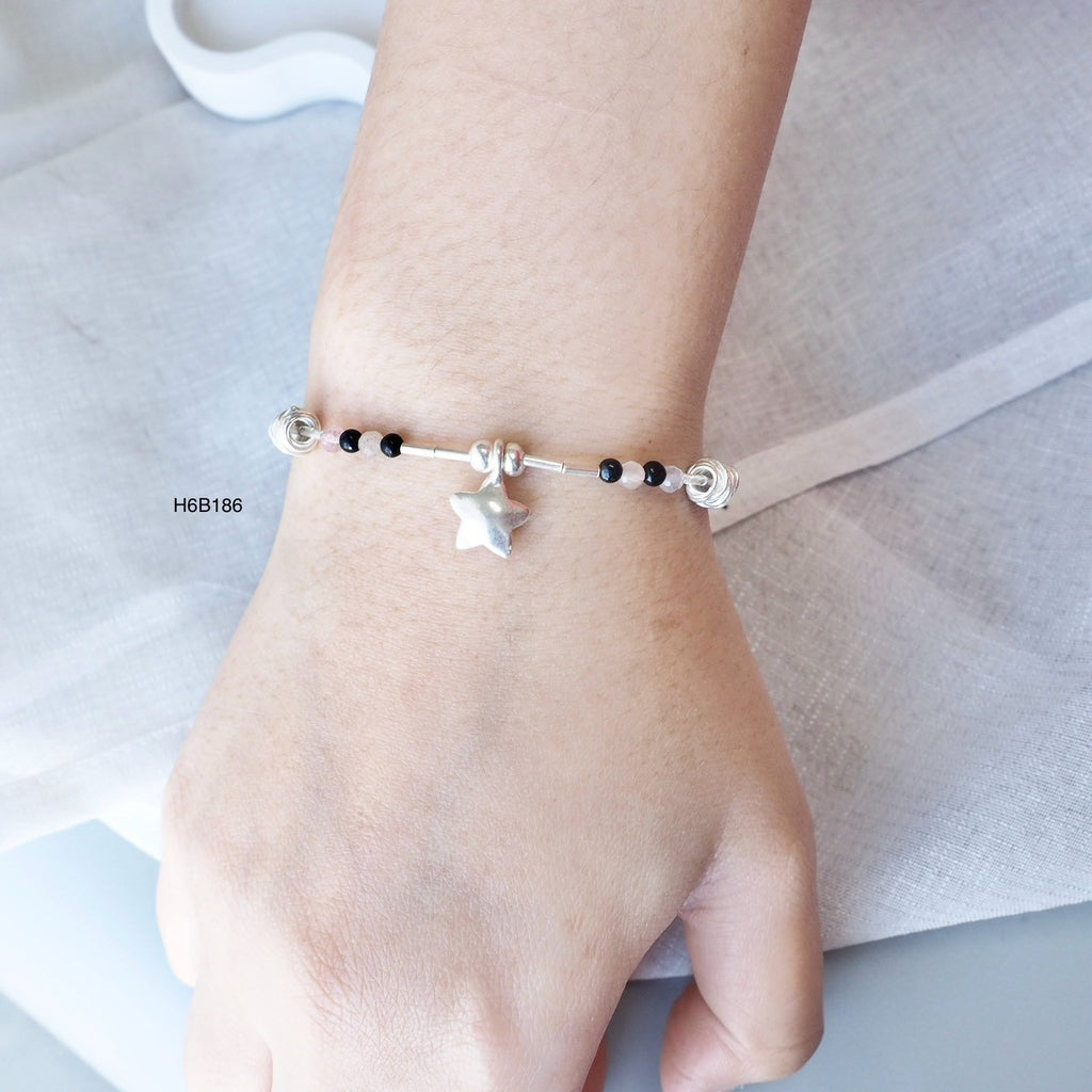 Bring a piece of Thailand home with this silver bracelet.