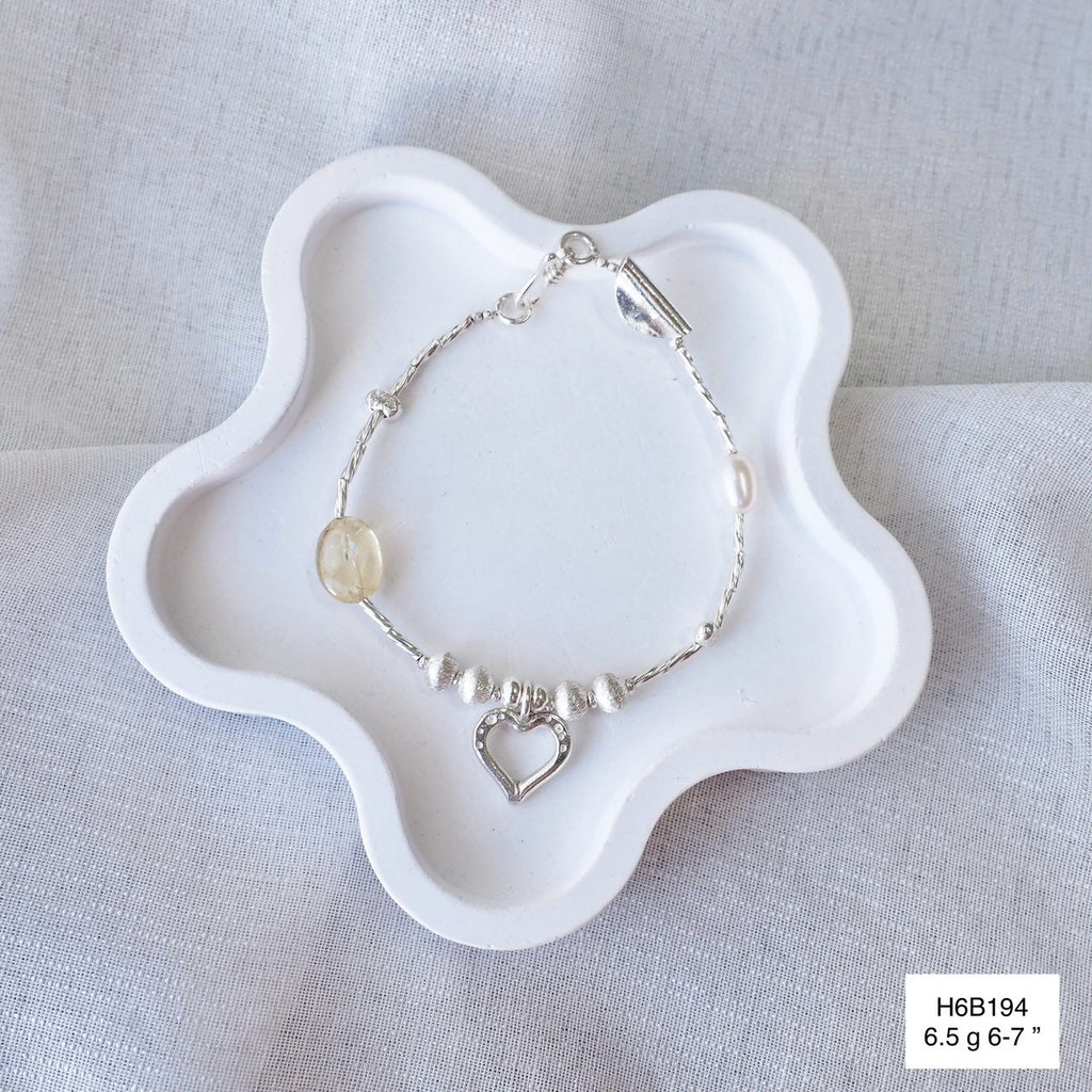Premium 98% silver, hand-detailed for the perfect bracelet.