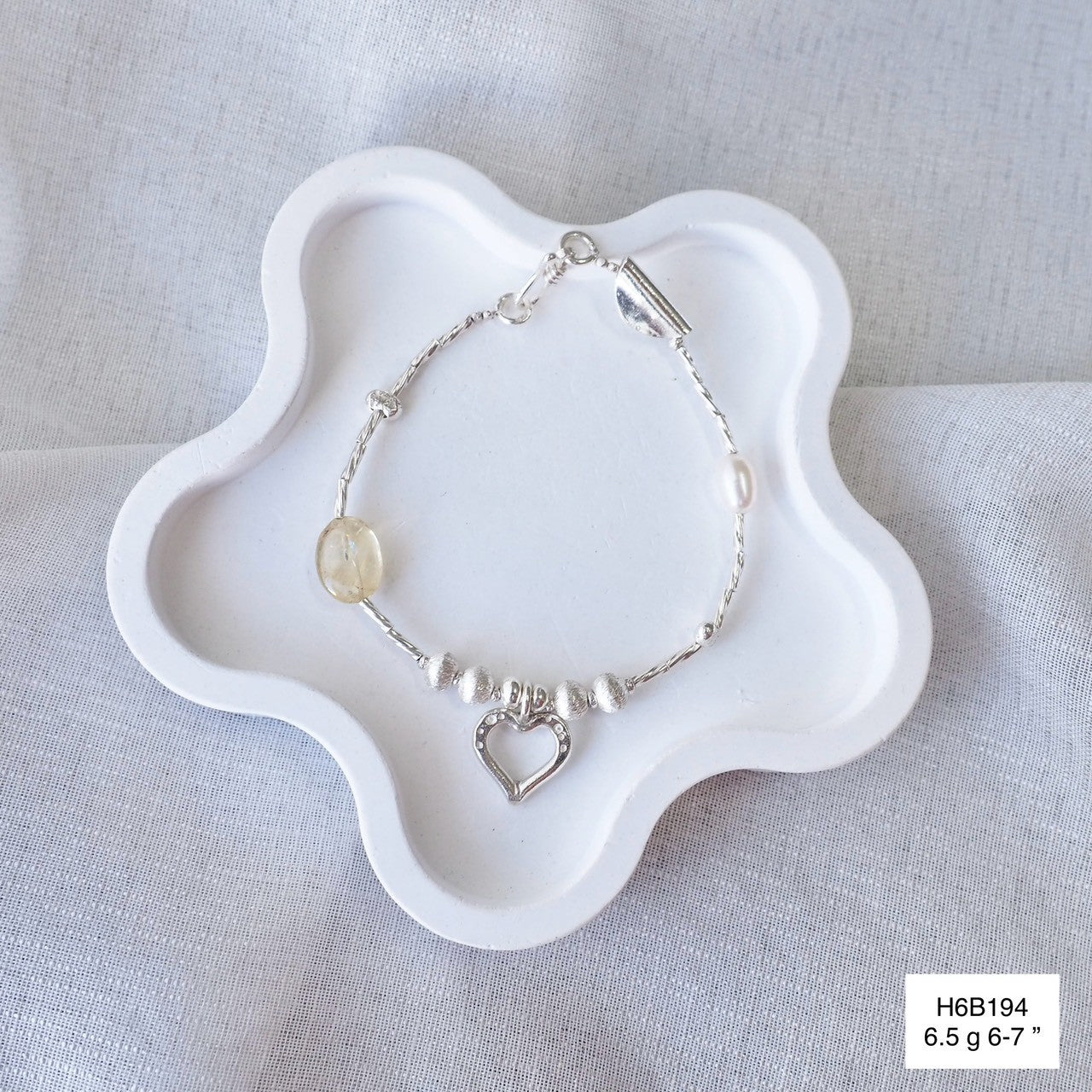 Premium 98% silver, hand-detailed for the perfect bracelet.