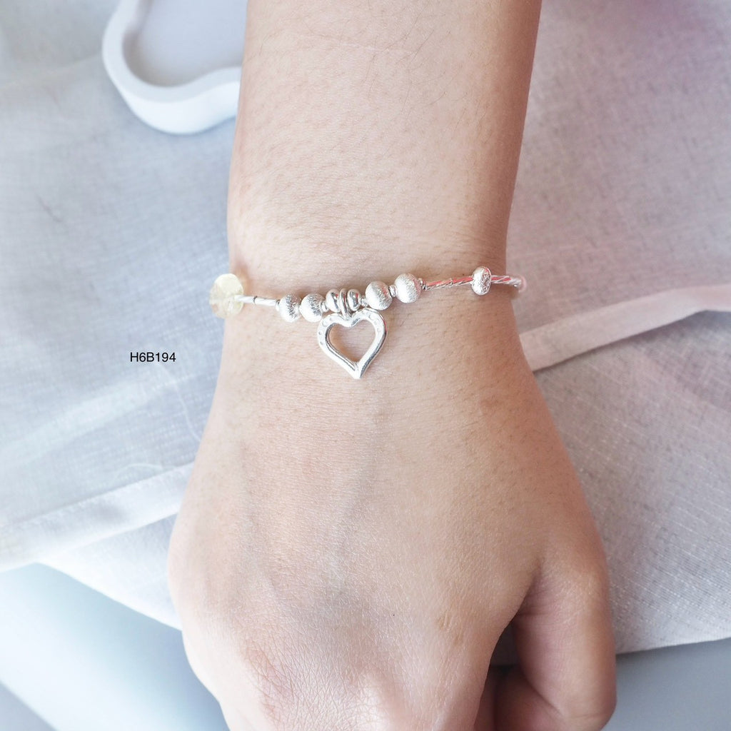 Premium 98% silver, hand-detailed for the perfect bracelet.