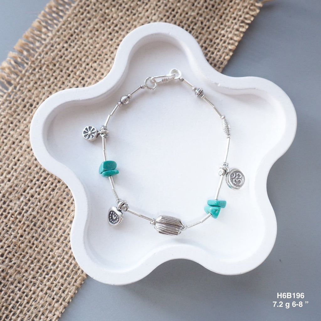 Sophistication handcrafted in Thailand. Slip on this silver bracelet.