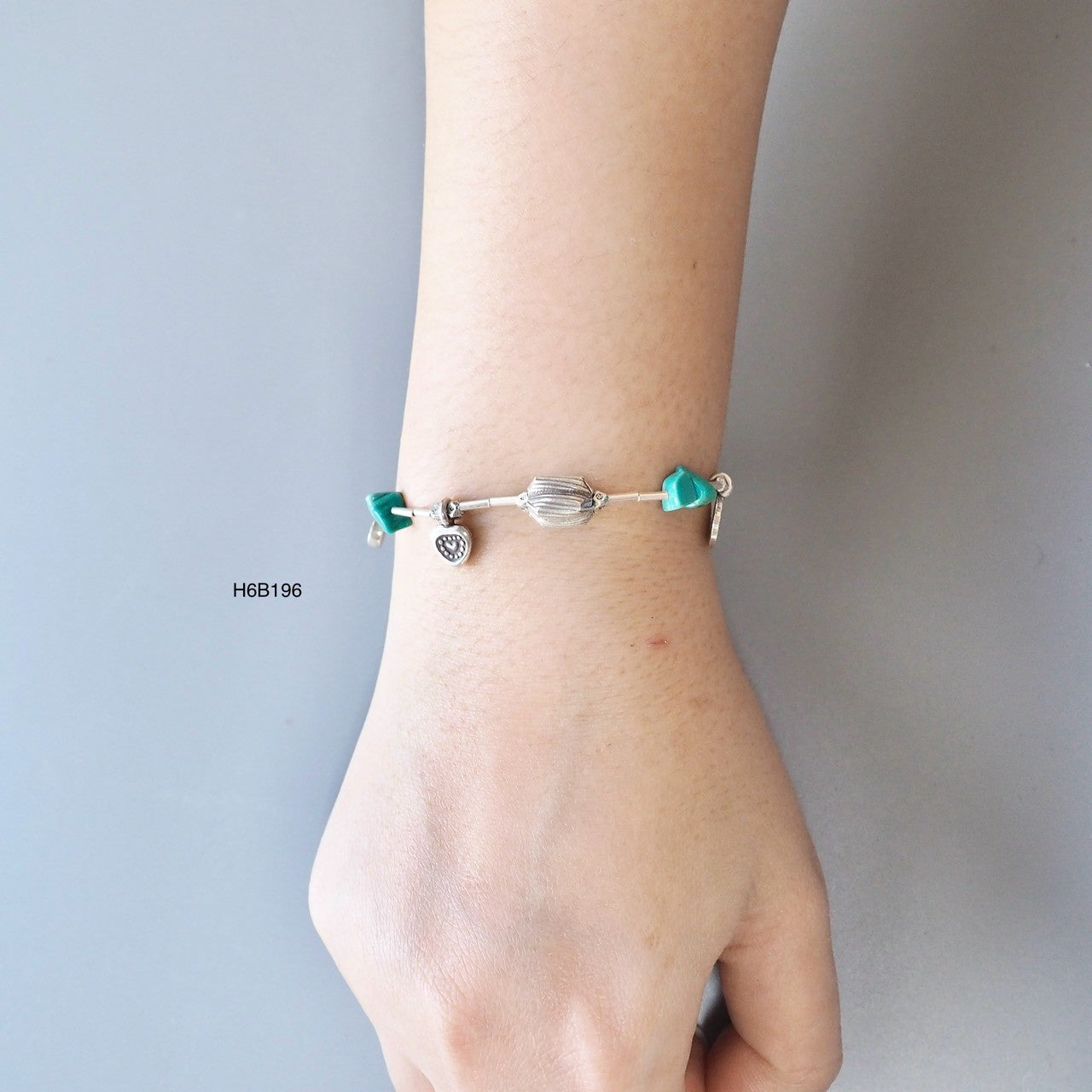Sophistication handcrafted in Thailand. Slip on this silver bracelet.