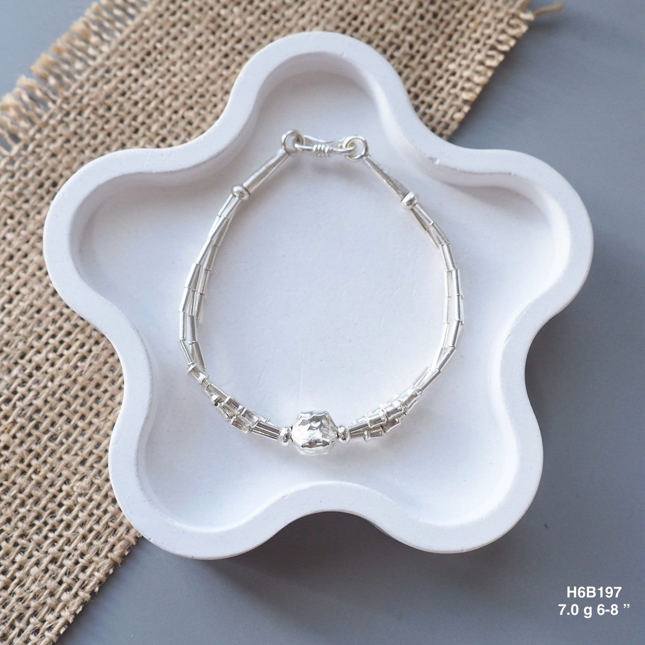Simple, pure, and handmade. The ultimate daily silver bracelet.