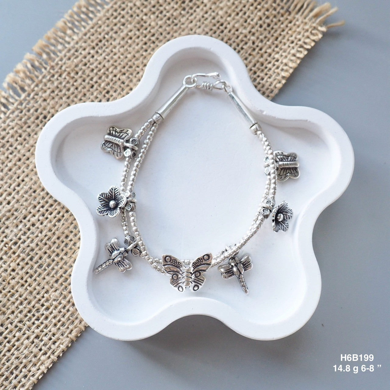 A subtle touch of Thai luxury for your wrist: this silver bracelet.