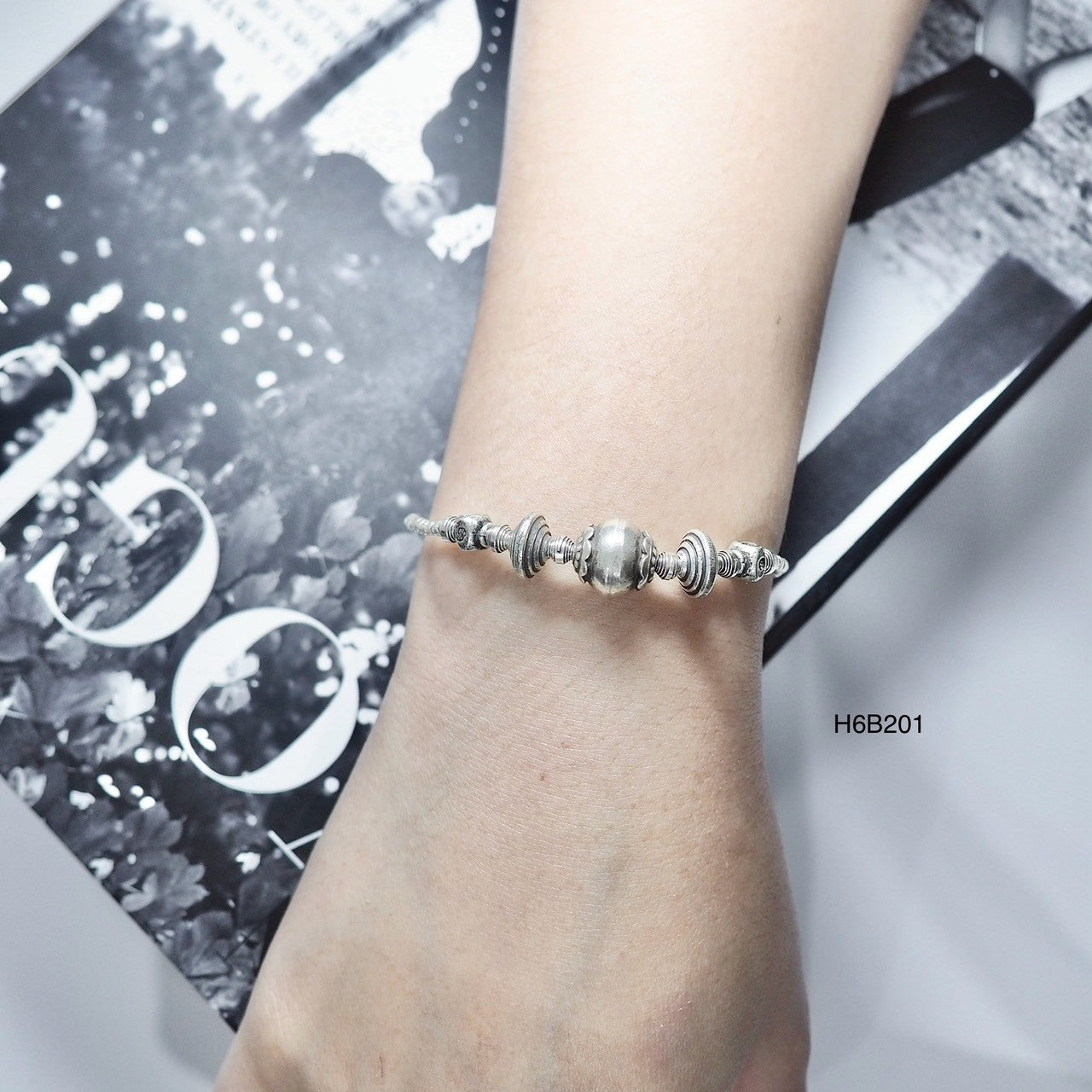 Match any outfit with this versatile, handmade silver bracelet.