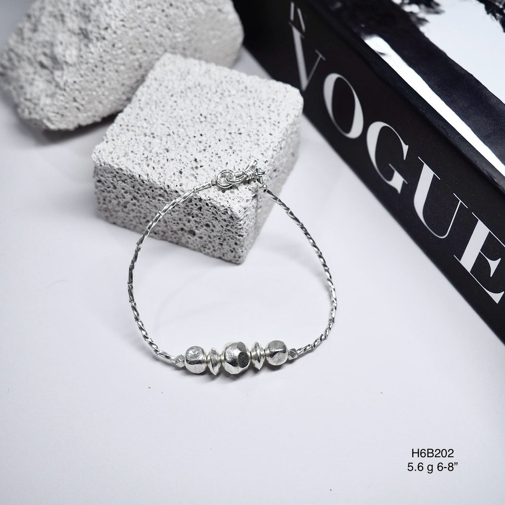 Effortless style starts with a 98% pure silver bracelet.