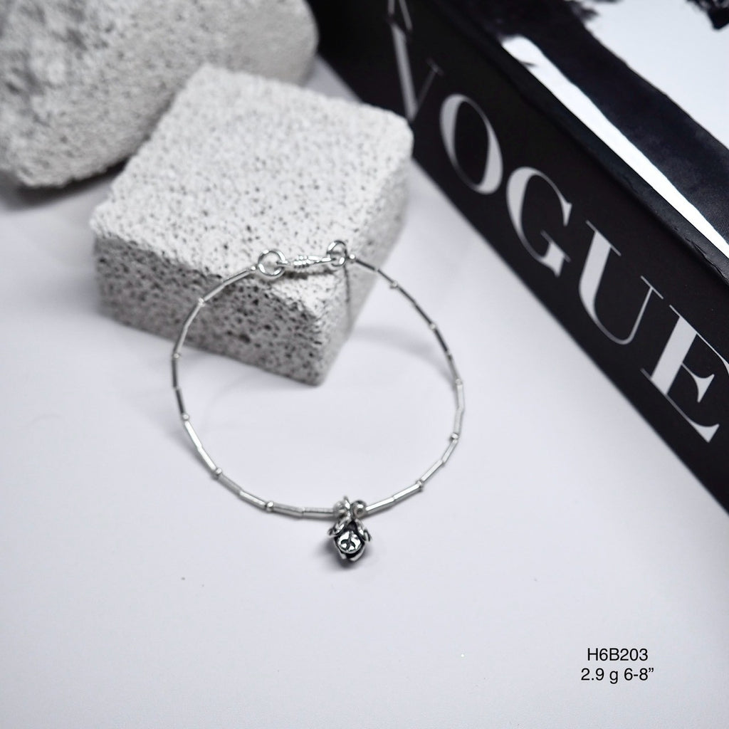 Keep it classic with a handmade Thai silver bracelet.