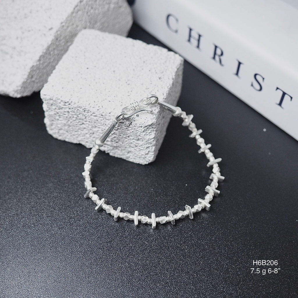Clean lines, pure silver. Fall in love with this Thai bracelet.