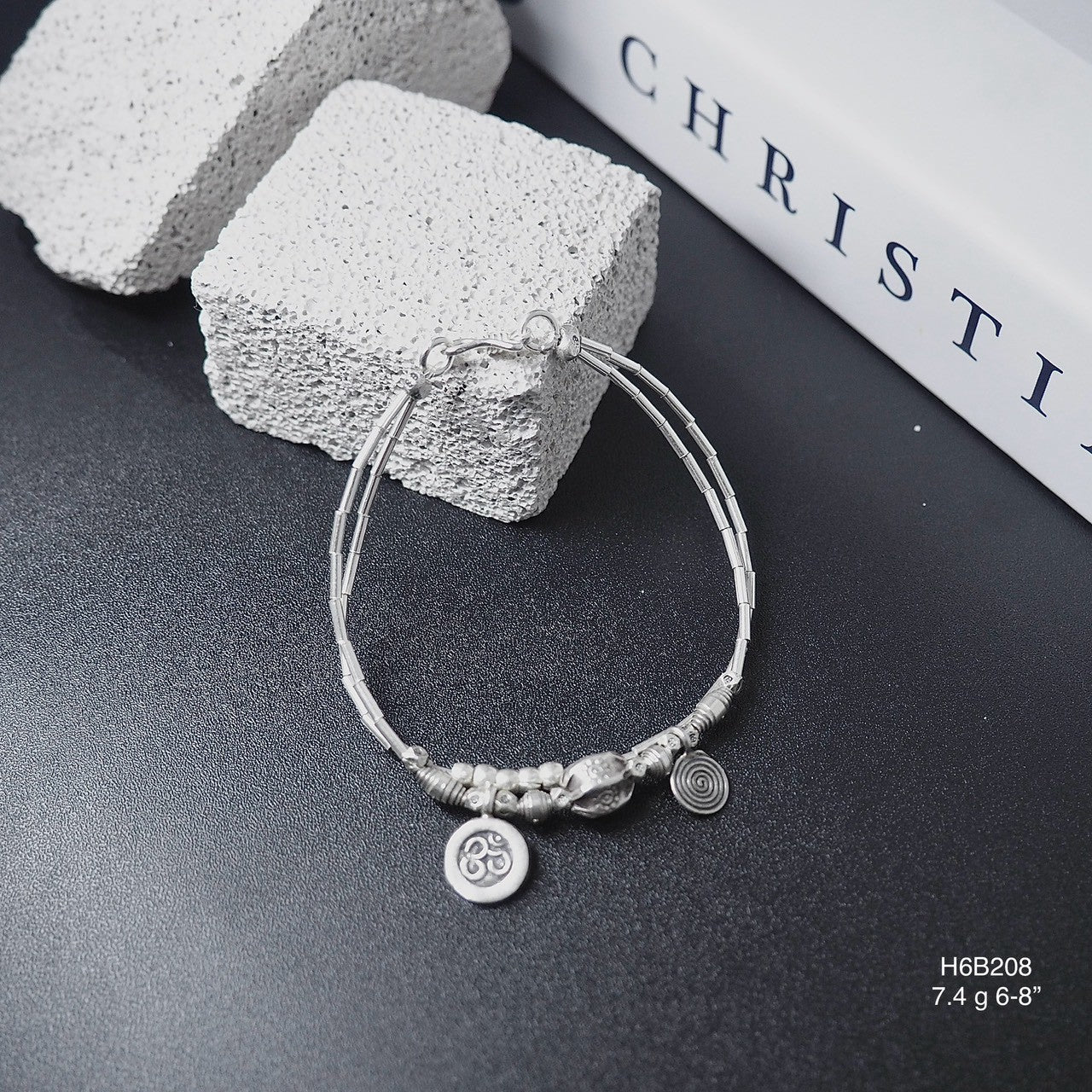 Upgrade your collection with a 98% pure silver bracelet.
