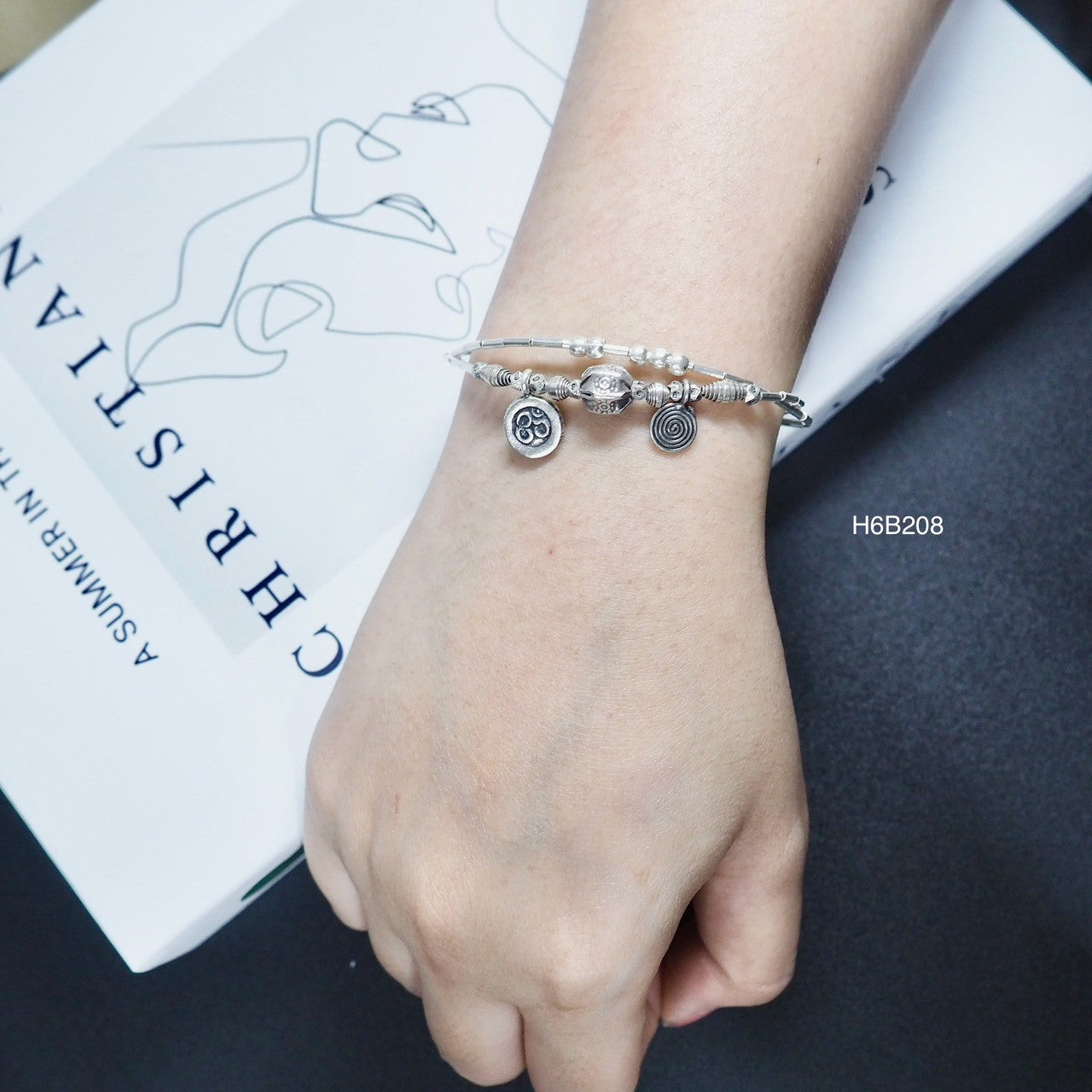 Upgrade your collection with a 98% pure silver bracelet.