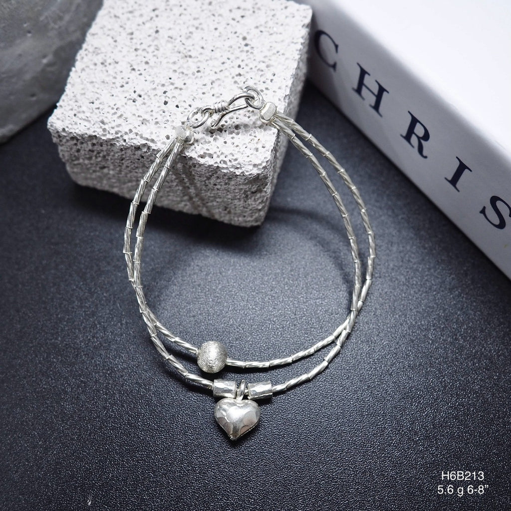 Add a touch of Thailand to your cart with this silver bracelet.