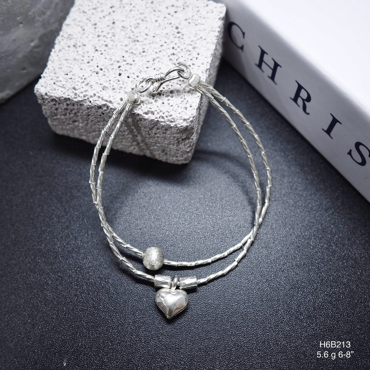 Add a touch of Thailand to your cart with this silver bracelet.