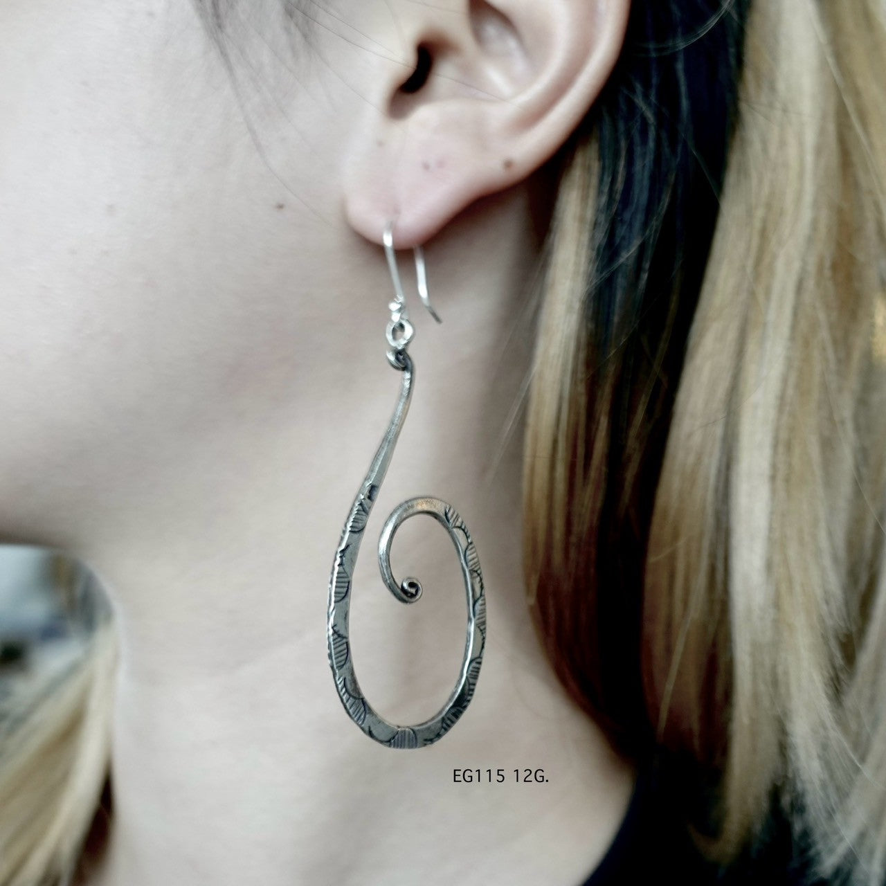 Handmade happiness in every pair. Silver earrings.