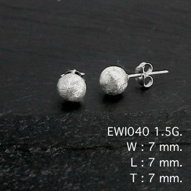 Tiny studs. Big impact. Stud earrings.