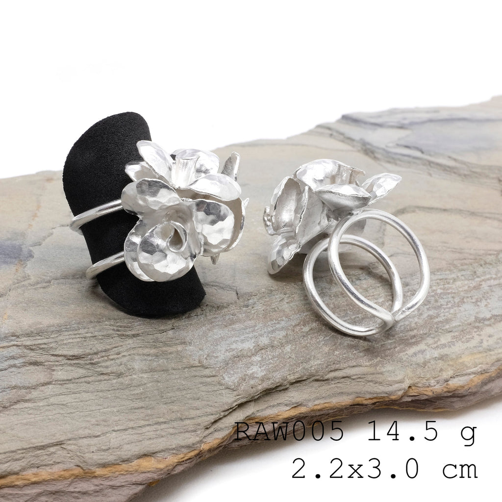 Hand-formed floral silver ring.