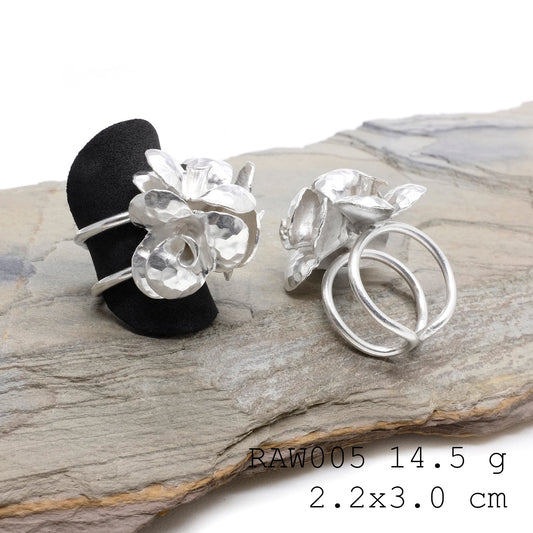Hand-formed floral silver ring.