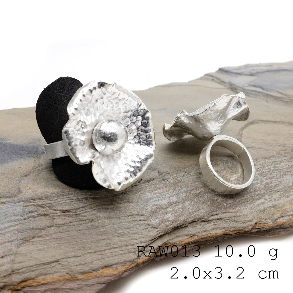 Artisan charm silver ring.