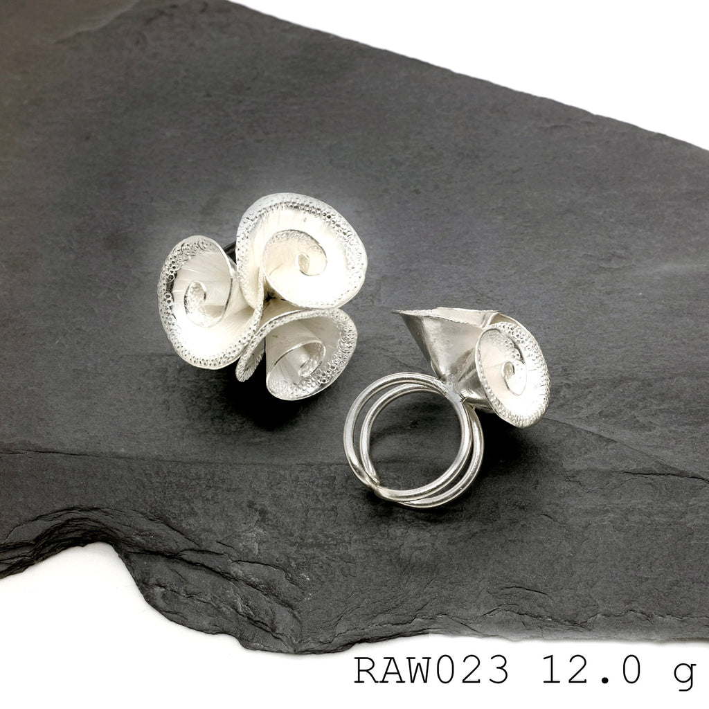 Bloom bright with this silver ring.