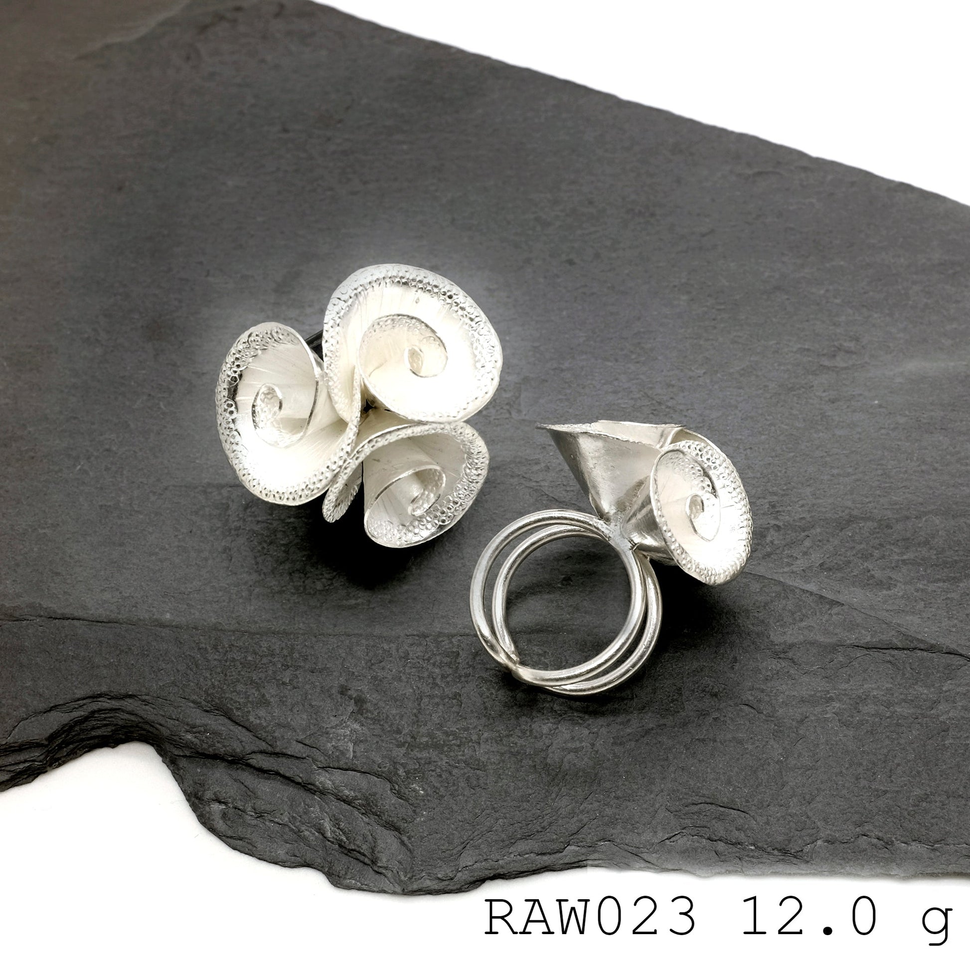 Bloom bright with this silver ring.