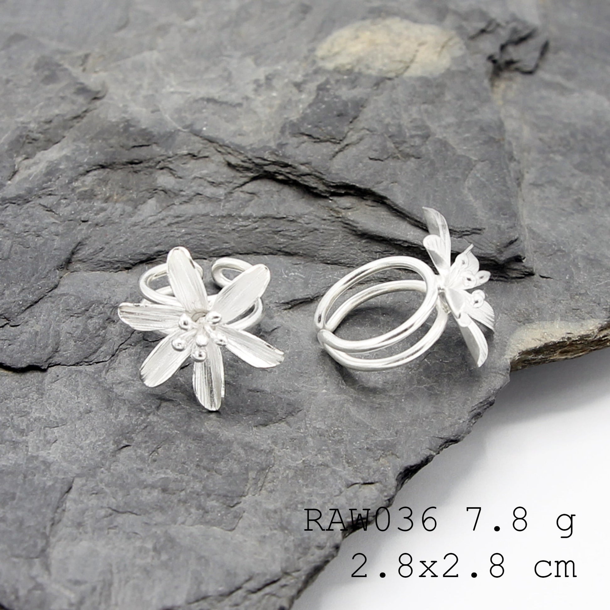 Subtle elegance. Flower silver ring.