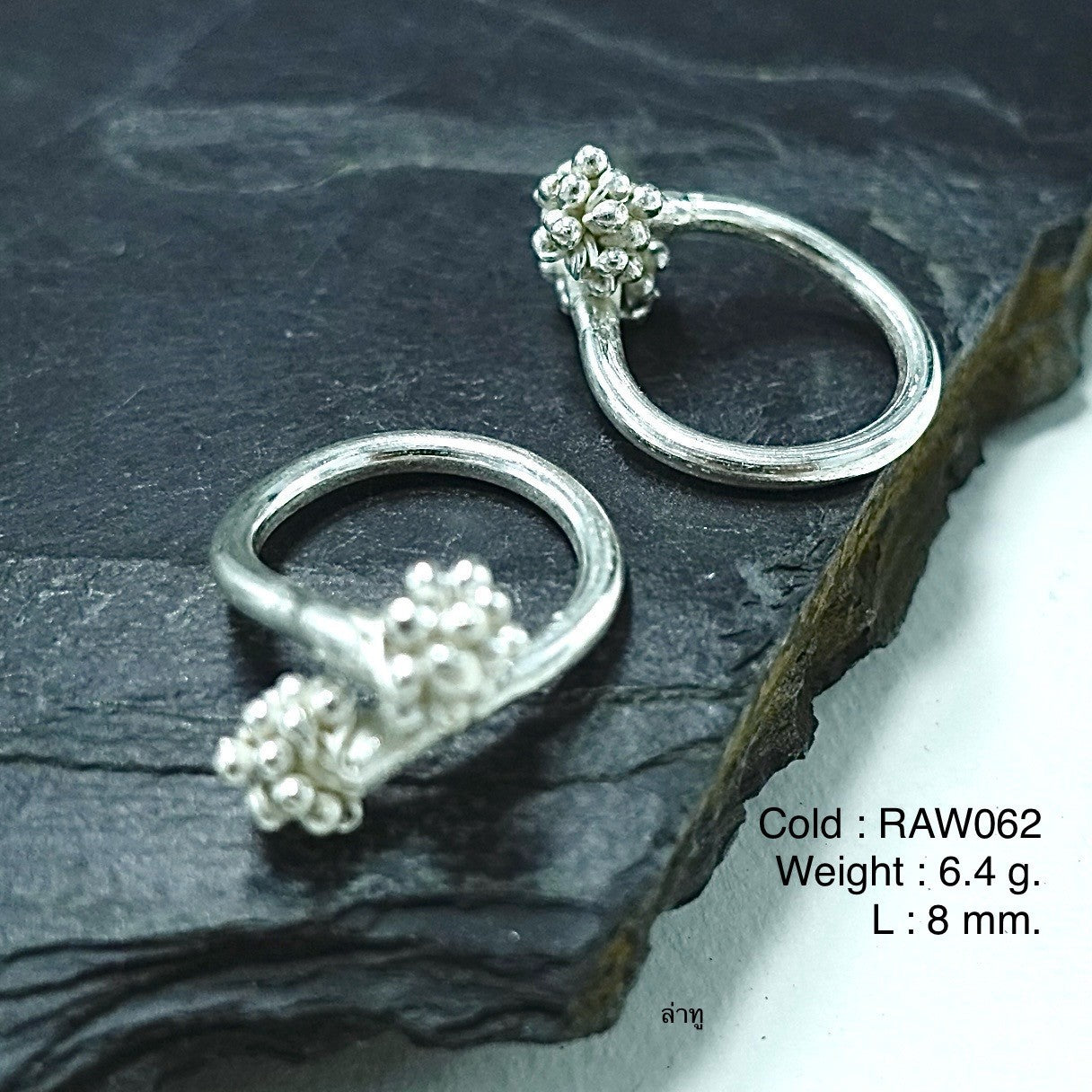 Floral motif, artisan silver ring.