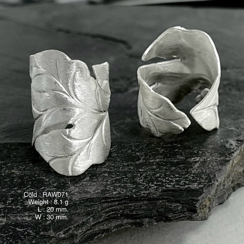 Handmade floral charm. This silver ring is art.