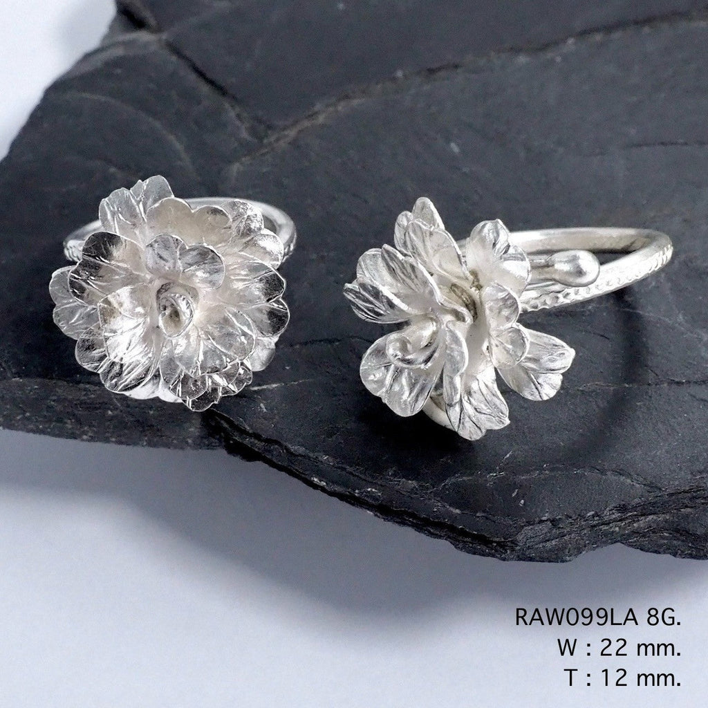 Handcrafted joy in a silver ring.