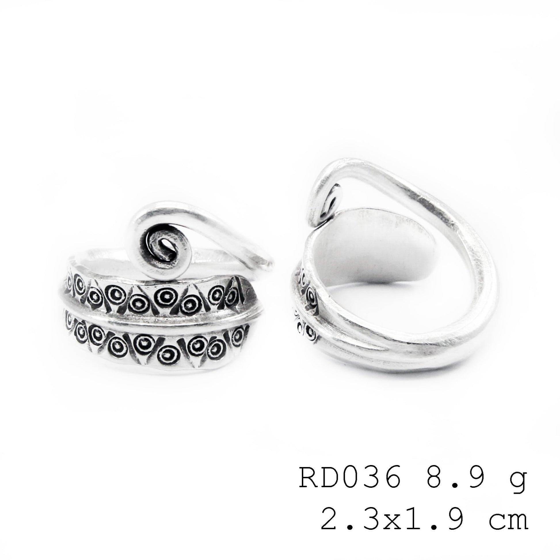 Uncoil your style. Statement silver ring.