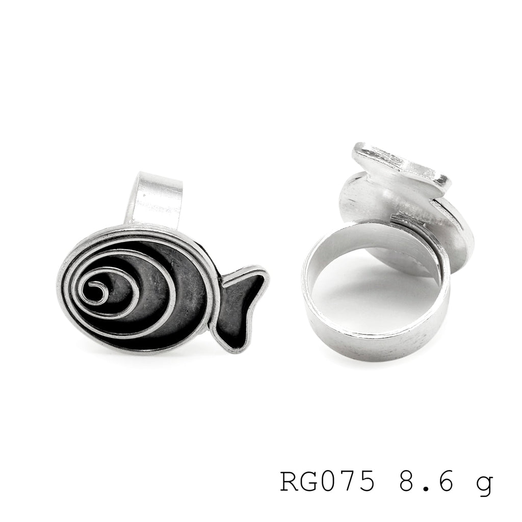 Nature's spiral, crafted in silver ring.