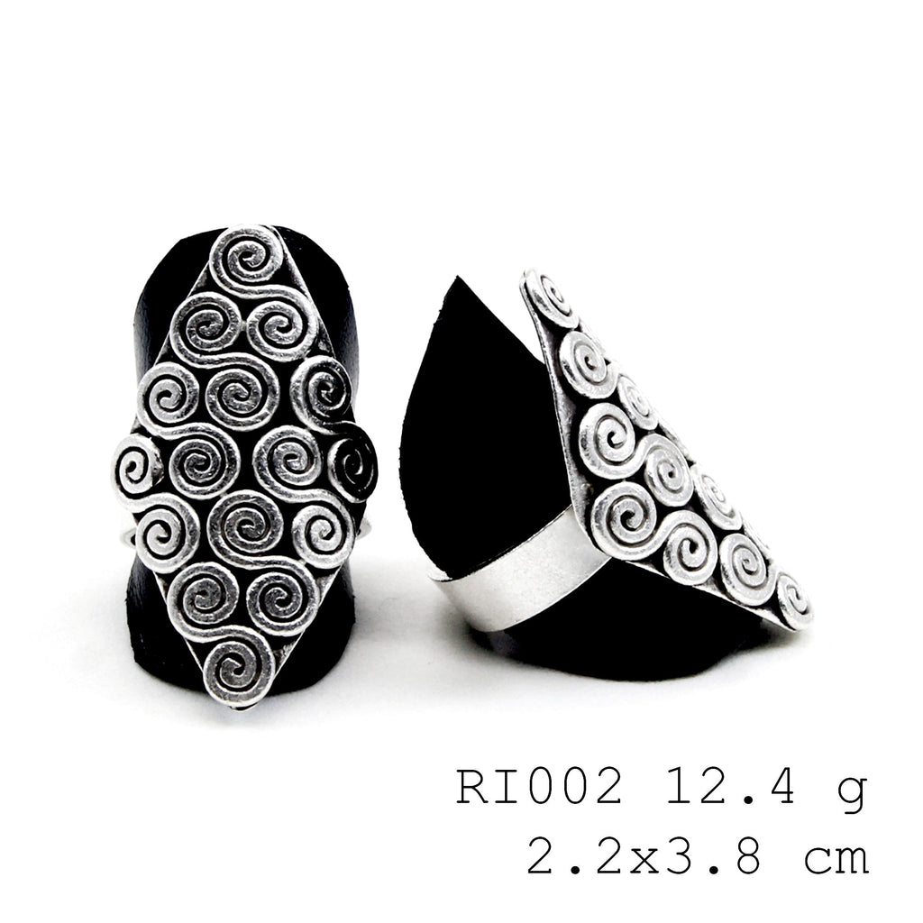 Abstract lines, artisan shine. Your new silver ring.