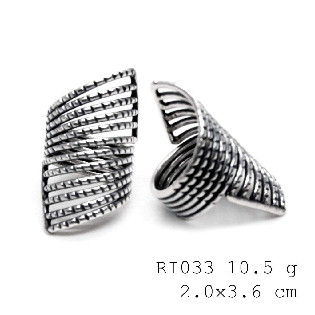 Snail trails and sterling details. Handmade silver ring.