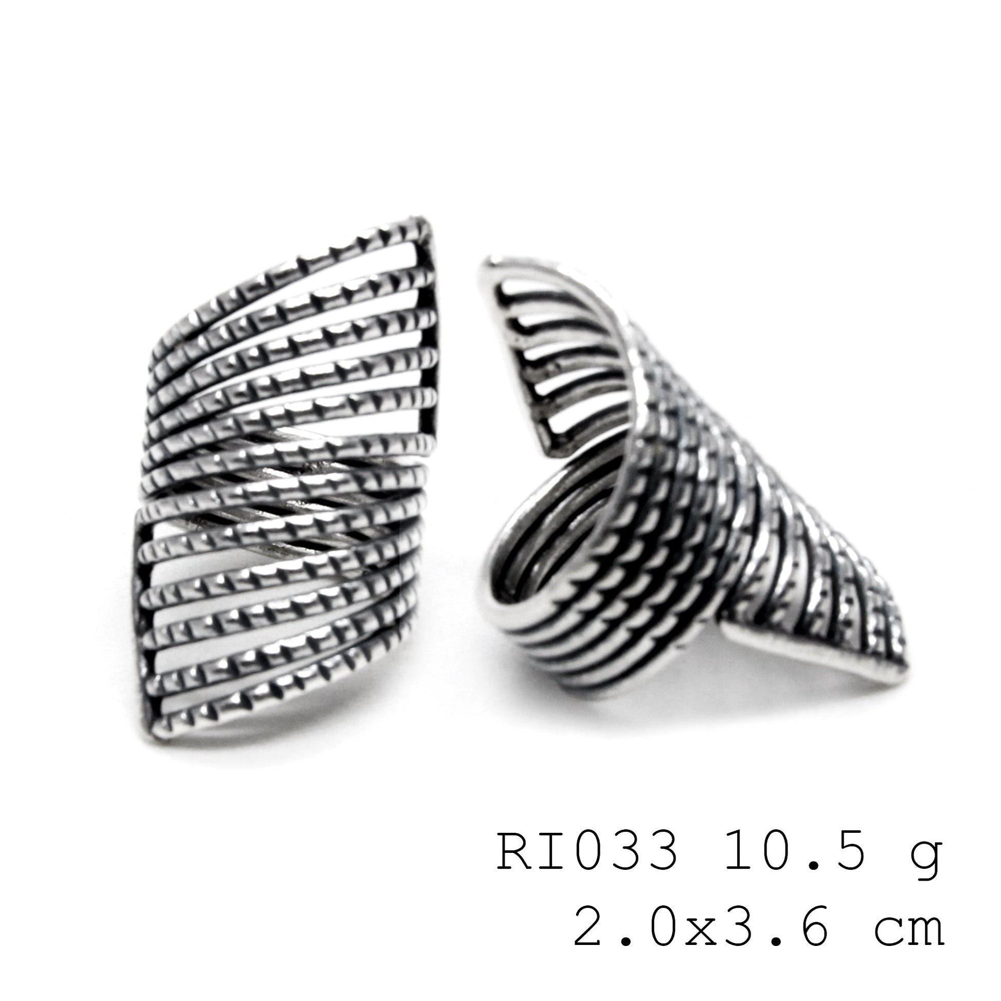 Snail trails and sterling details. Handmade silver ring.