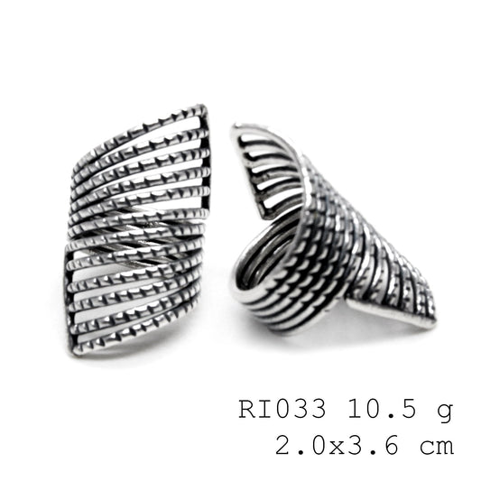 Snail trails and sterling details. Handmade silver ring.