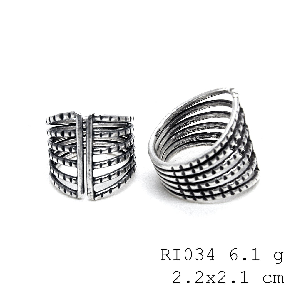 From my hands to yours. This unique silver ring.