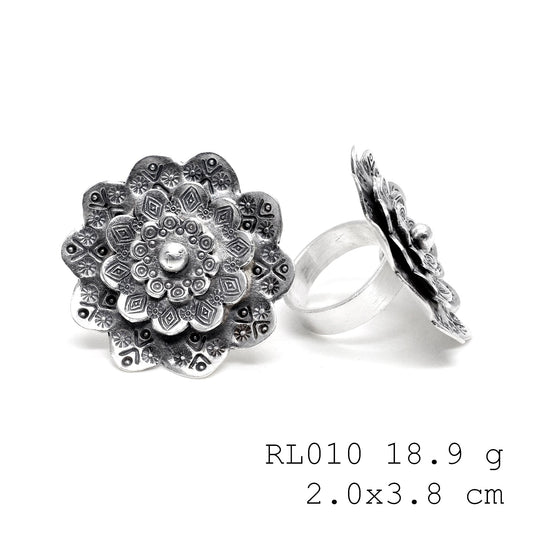 Minimalism with a floral twist silver ring.