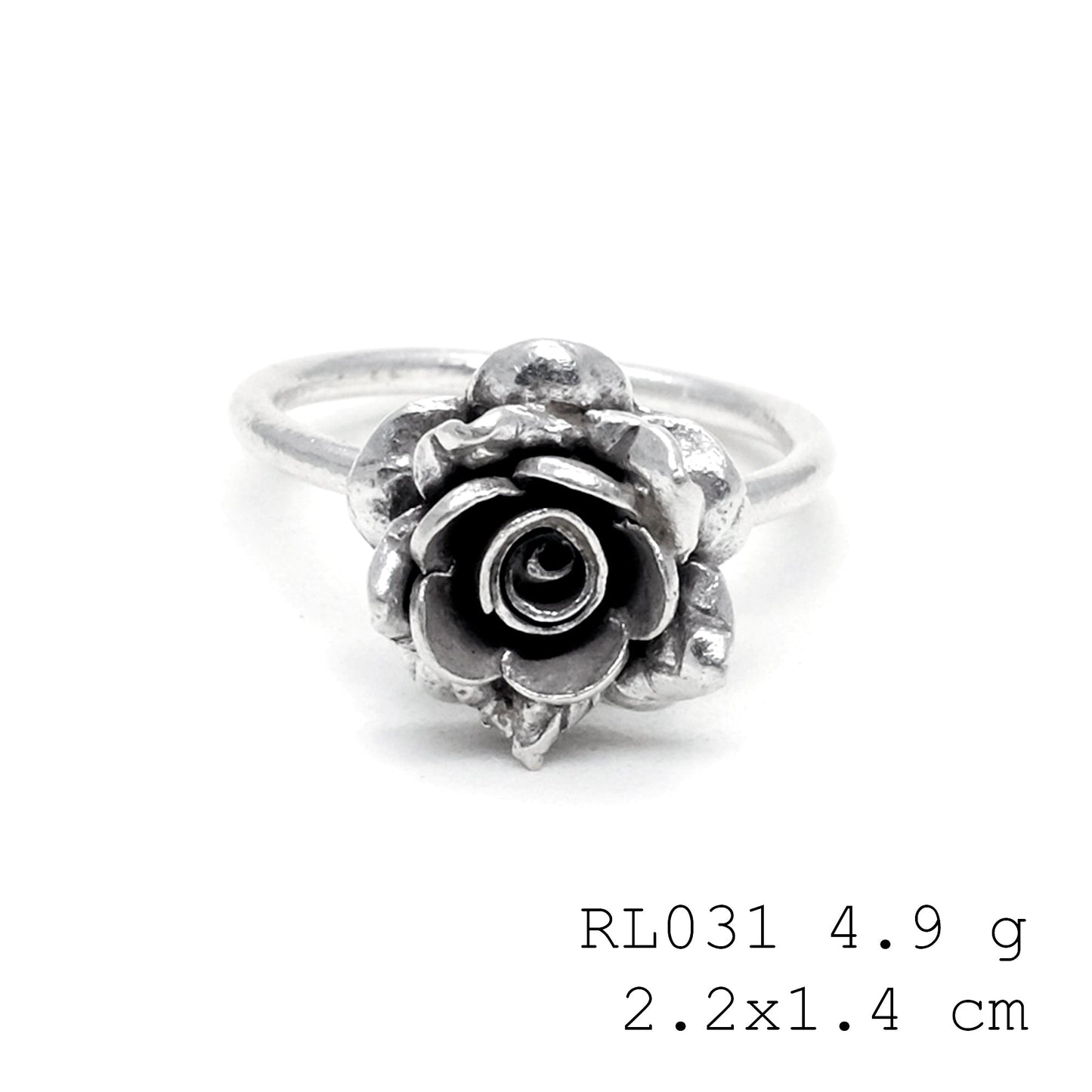 A whimsical touch with a handmade silver ring.