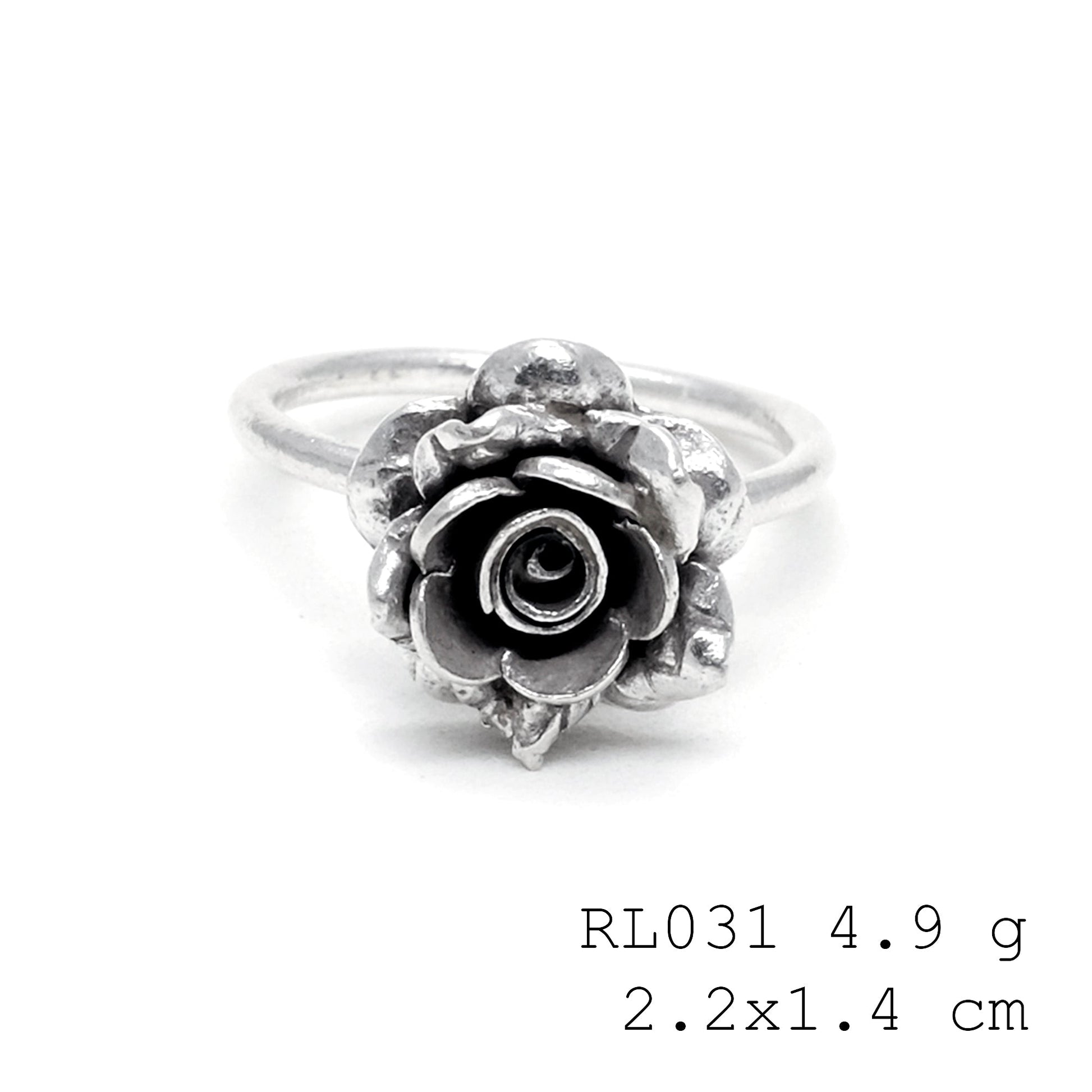 A whimsical touch with a handmade silver ring.