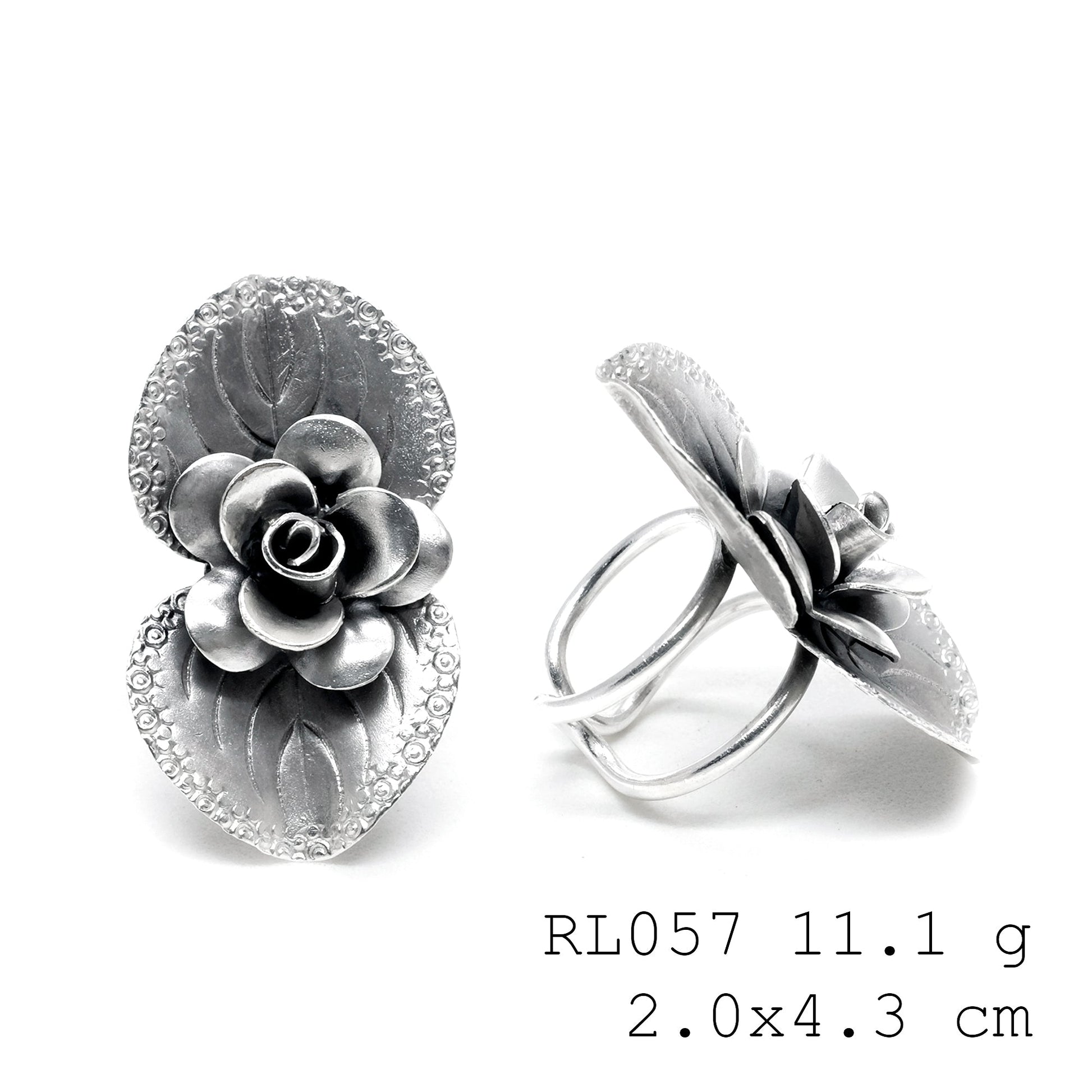 Eternal flowers in a shimmering silver ring.