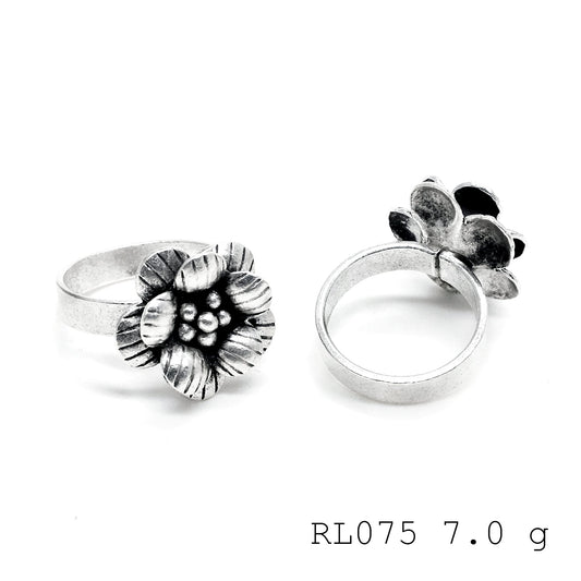 Every petal is hand-shaped on this silver ring.