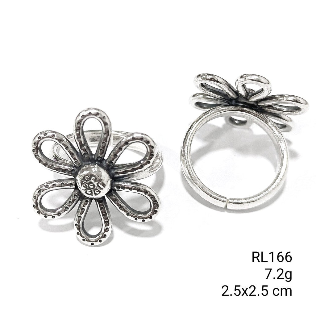 Delicate details on a handmade silver ring.