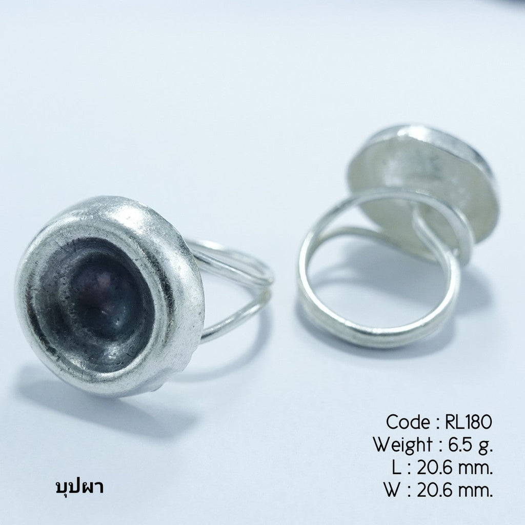 Hand-carved petals, one unique silver ring.